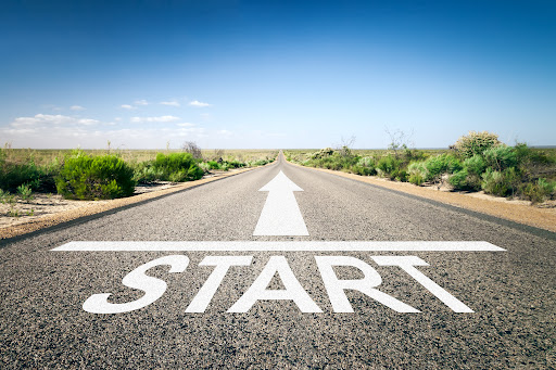 A road with START written before an arrow pointing forward